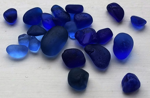 Pieces of cobalt blue sea glass
